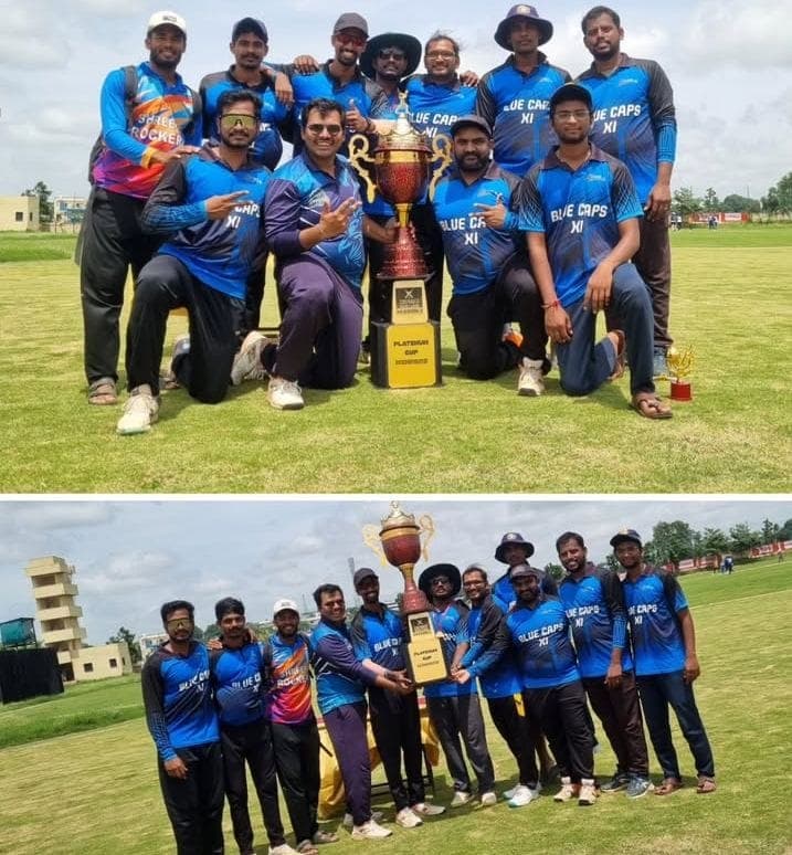 Blue Caps XI celebrating Platinum Cup victory with trophy